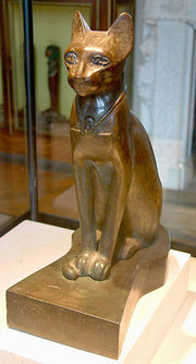 An Ancient Egyptian figurine of a cat, from the Louvre museum.
